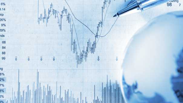 Pen on top of paper with graphs